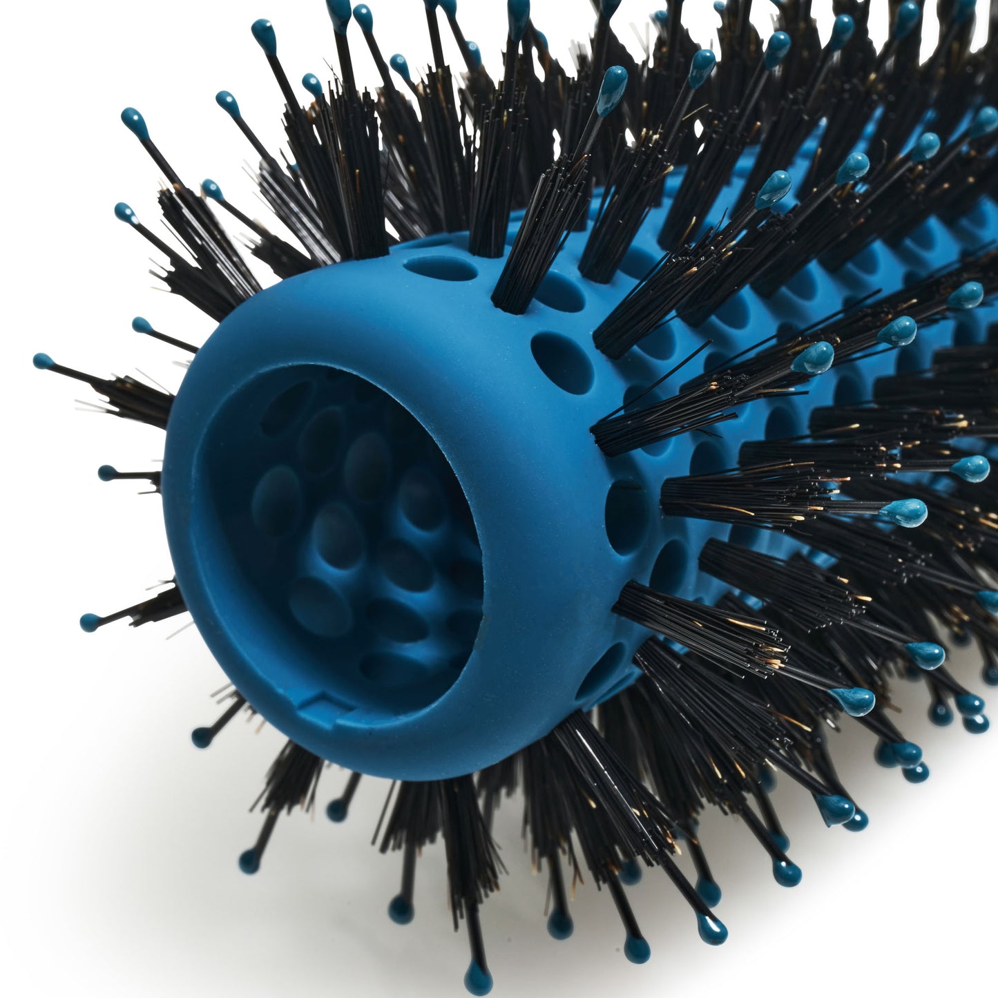 Close up of barrel of blue detangling barrel blow drying brush with black bristles