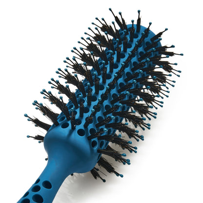 Close up of Blue detangling barrel blow drying brush with black bristles