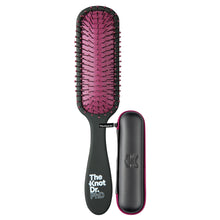 Load image into Gallery viewer, Slimline black detangling brush with pink pad and black protector case