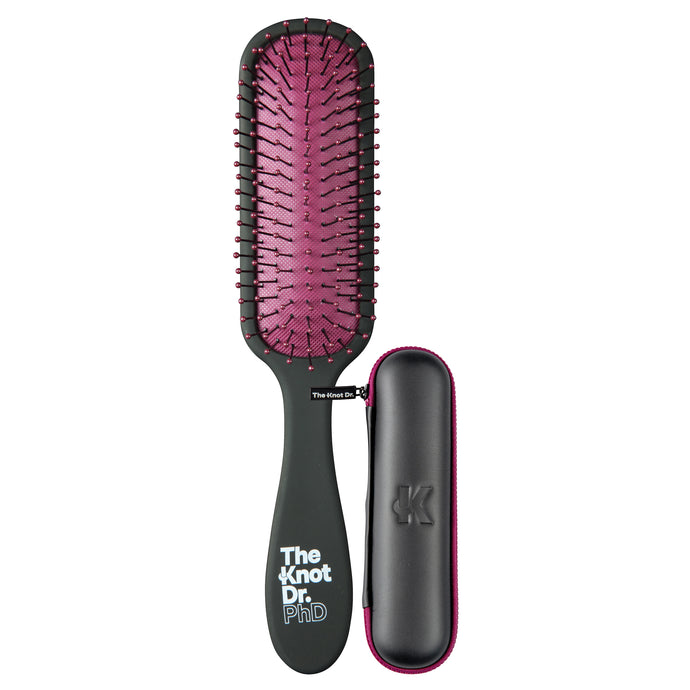 Slimline black detangling brush with pink pad and black protector case