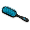 Pro detangling hairbrush in black with blue pad laying flat