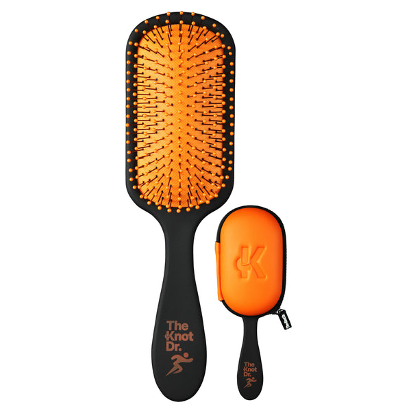Black and orange detangling hairbrush for gym use with protective headcase in orange