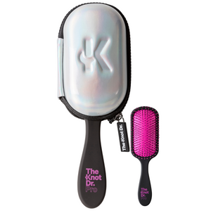 Holographic brush head protector case with black and pink detangling brush